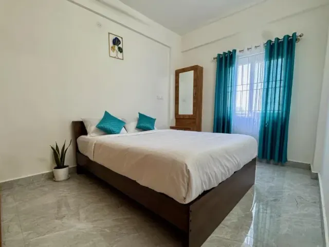 Photo 10 of 10 at Truelife Whitefield - Premium 1 BHK Apartments - Prime location - Easy access to Main Rd - Metro - ITPL - Fast WiFi - Kitchen - Smart TV - Power backup - Park - Garden views