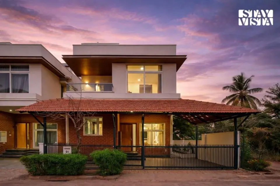 Photo 1 of 10 at Brickstone Villa by VEO, StayVista - 3BHK with Lake View & Shared Pool